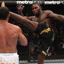 Anthony Johnson, right, misses a kick against Vitor Belfort in their January 2012 fight in Rio de Janeiro. (Getty Images)