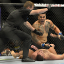 Soa Palelei knocks out Pat Barry in a UFC bout in December 2013. (Getty Images)