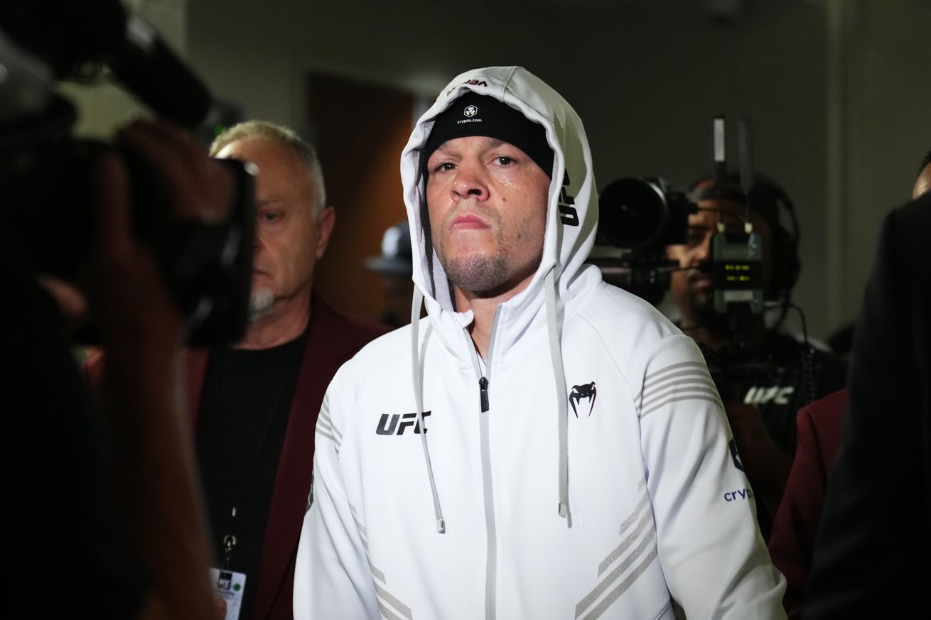 Nate Diaz walks towards the Octagon ahead of his UFC 279 headliner with Tony Ferguson.