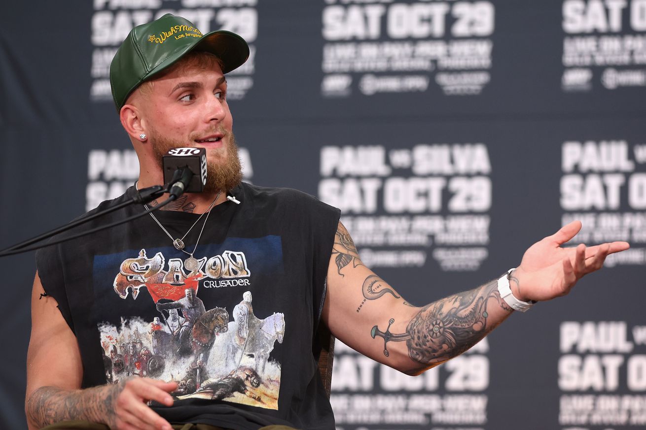 Jake Paul answers questions at a press conference for his upcoming bout with Anderson Silva.