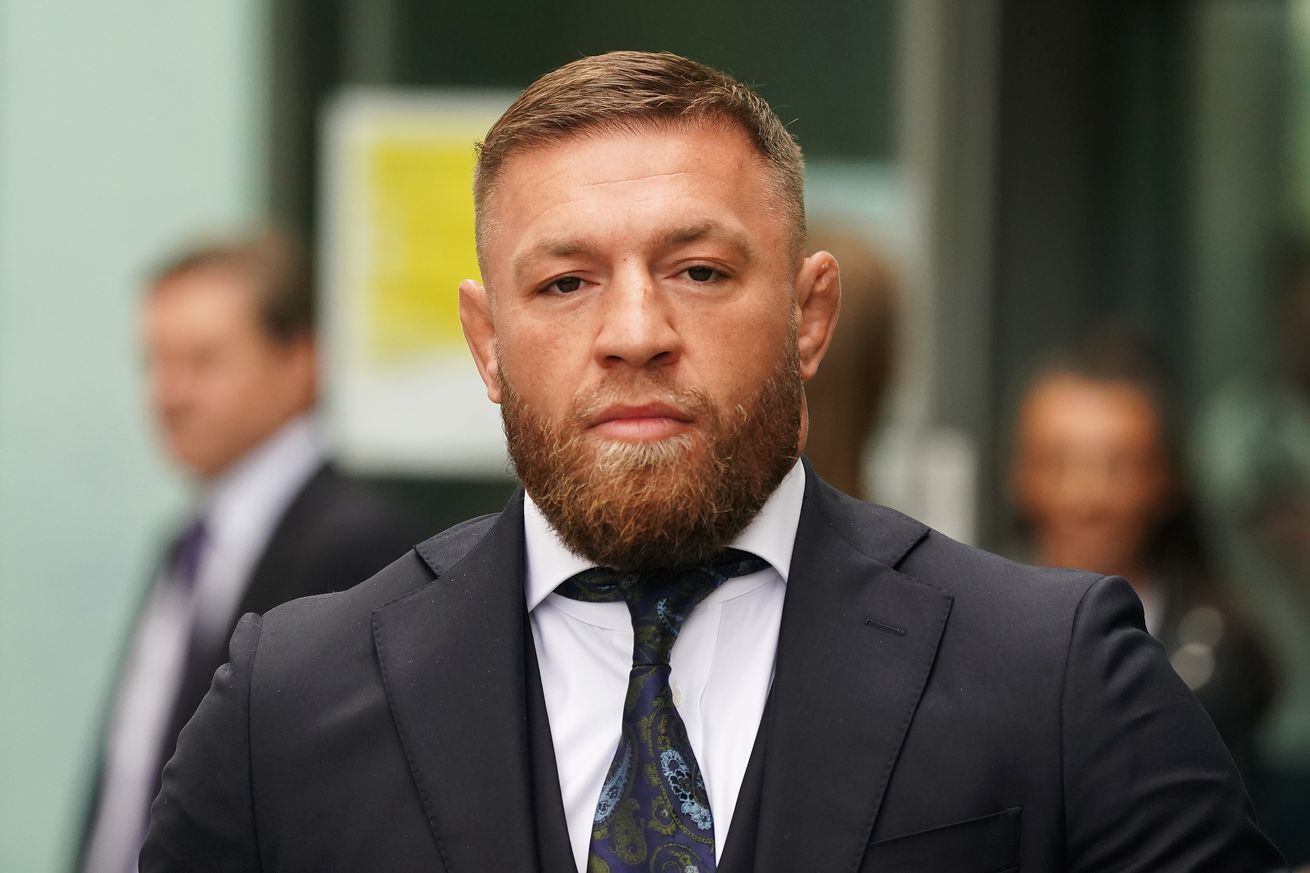 Conor McGregor leaving court over a driving offense.