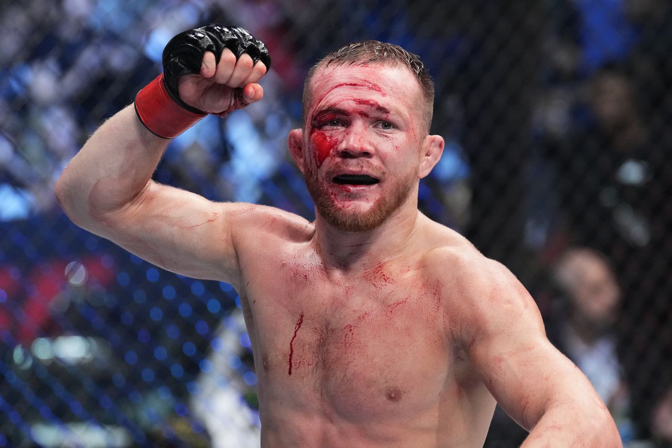 Petr Yan celebrates an expected victory over Sean O’Malley at UFC 280.