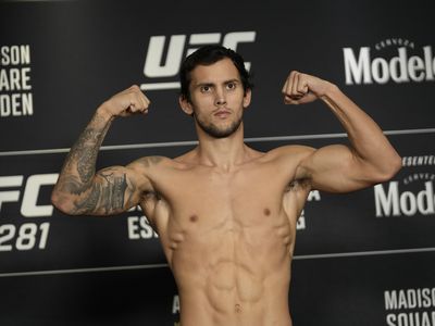 Puelles poses for the cameras during UFC 281 weigh-ins.