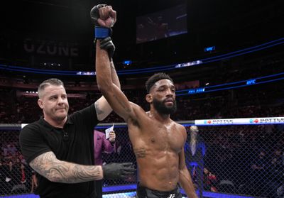 Phil Rowe gets his hand raised after beating Niko Price.