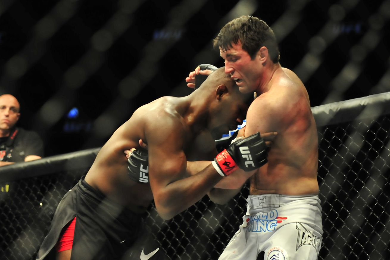 Jon Jones and Chael Sonnen tie up during their UFC 159 bout in 2013.